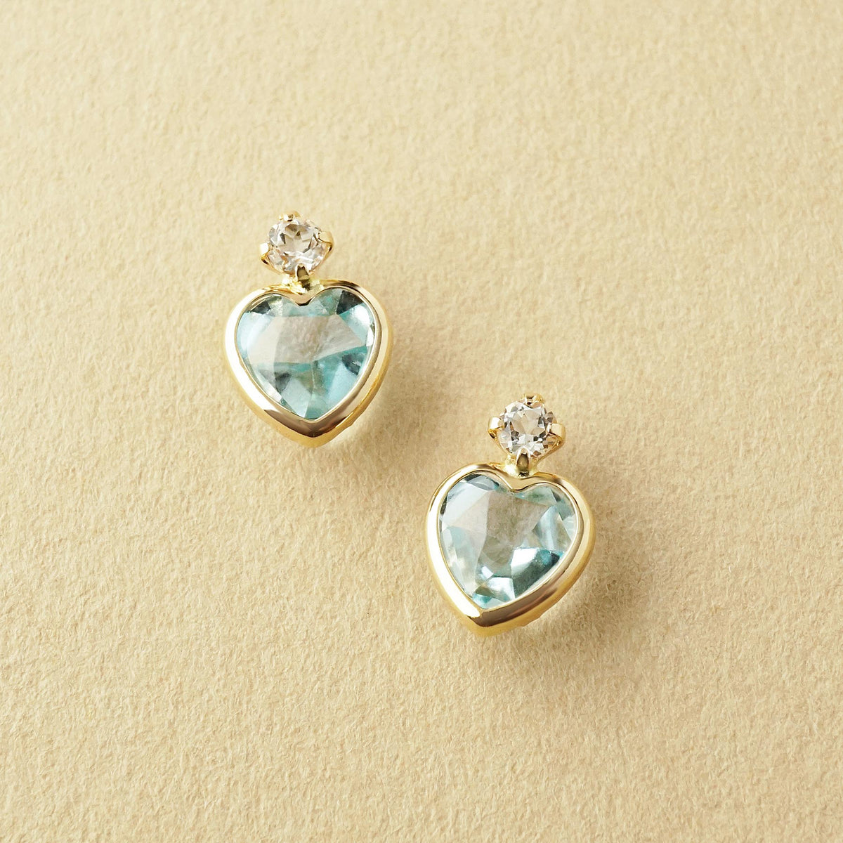 10K Sky Blue Topaz Heart Love Earrings (Yellow Gold) - Product Image