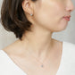 10K Sky Blue Topaz Heart Love Earrings (Yellow Gold) - Model Image