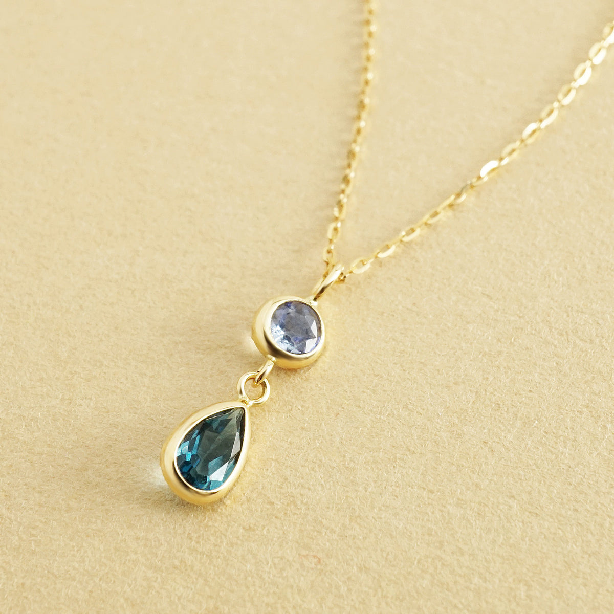 10K Blue Topaz Dew Drop Swinging Necklace (Yellow Gold) - Product Image