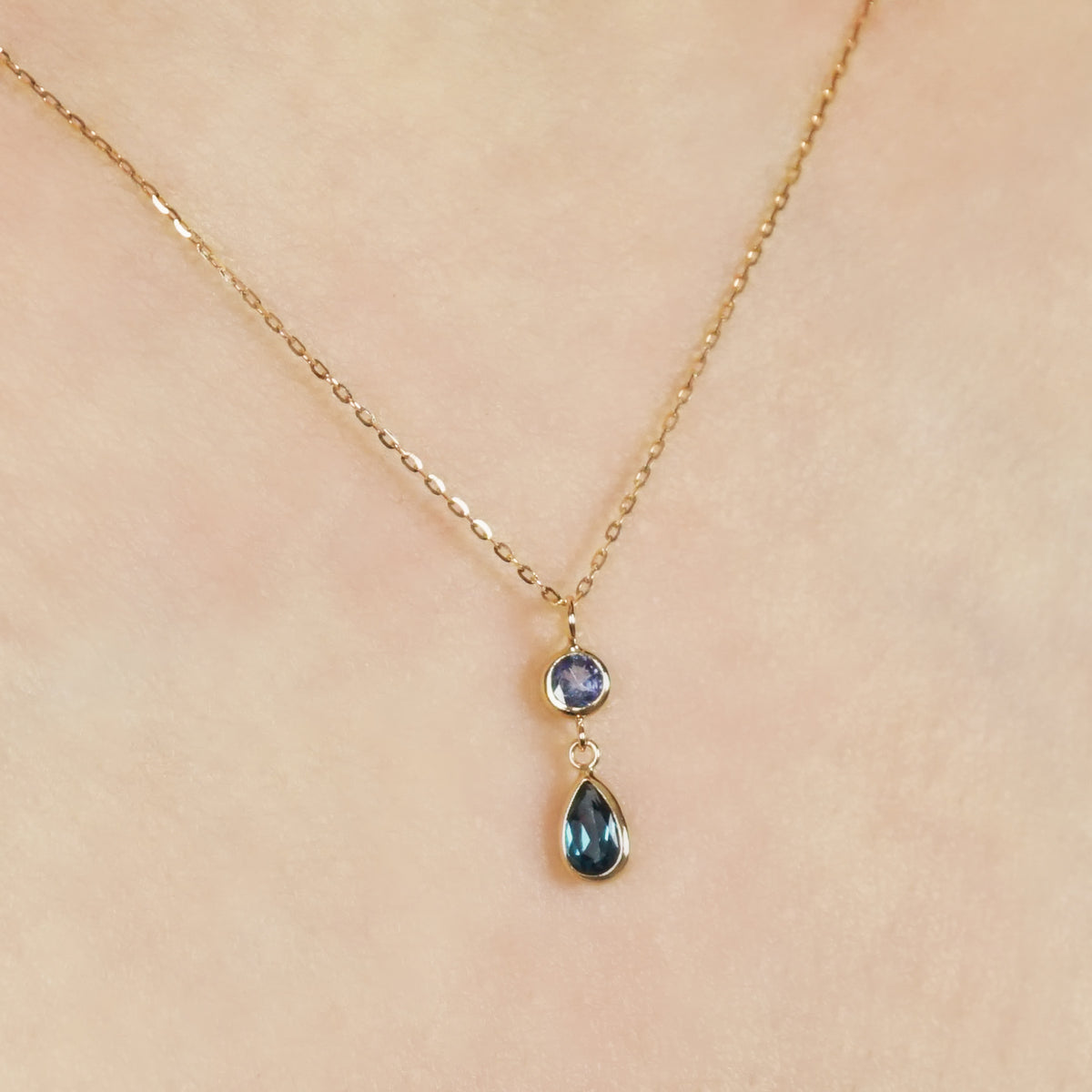10K Blue Topaz Dew Drop Swinging Necklace (Yellow Gold) - Model Image