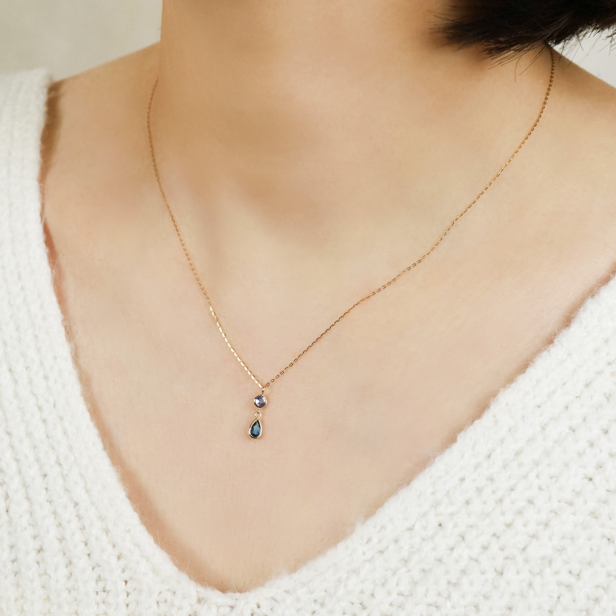10K Blue Topaz Dew Drop Swinging Necklace (Yellow Gold) - Model Image