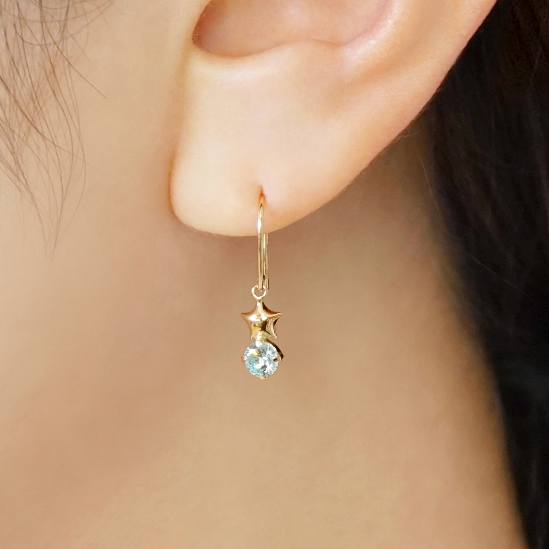 10K Star Wire Earrings (Yellow Gold) - Model Image