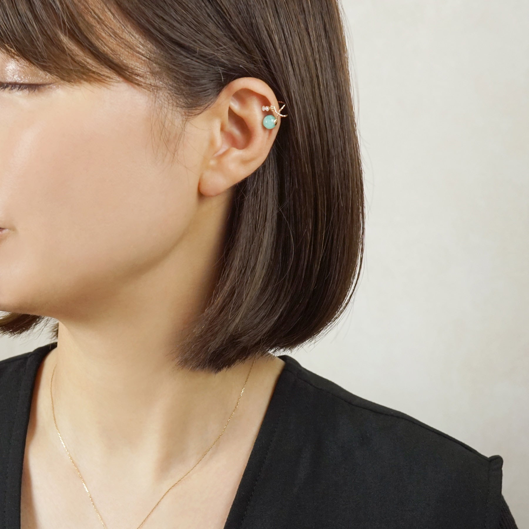 10K Planet Moissanite Ear Cuff (Yellow Gold) - Model Image