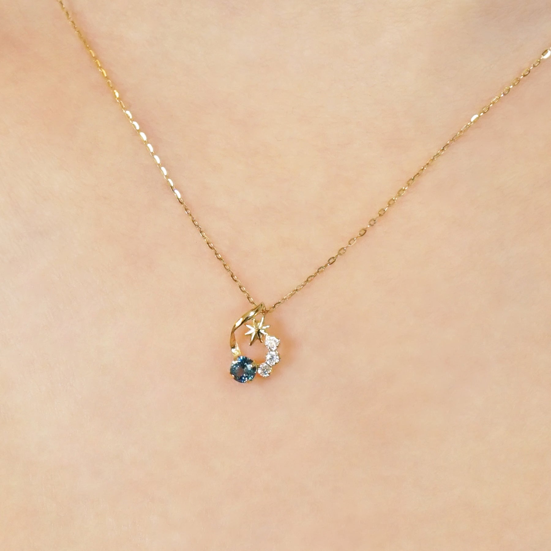10K Blue Topaz and Moissanite Necklace [Falling Star] (Yellow Gold) - Model Image
