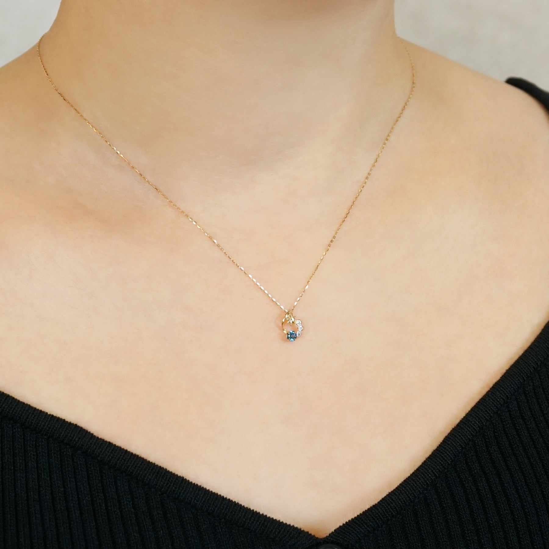 10K Blue Topaz and Moissanite Necklace [Falling Star] (Yellow Gold) - Model Image