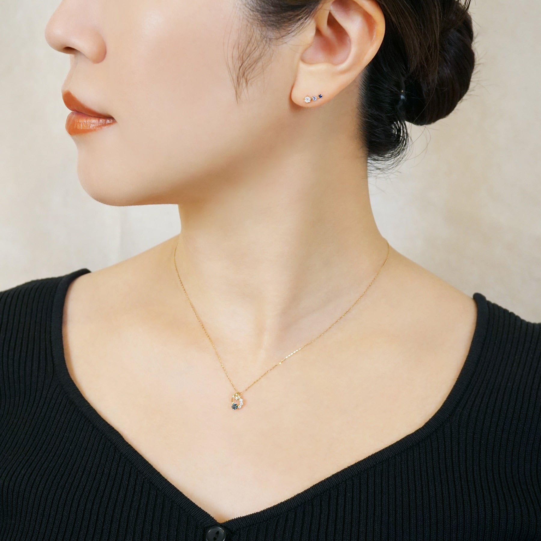 10K Blue Topaz and Moissanite Necklace [Falling Star] (Yellow Gold) - Model Image