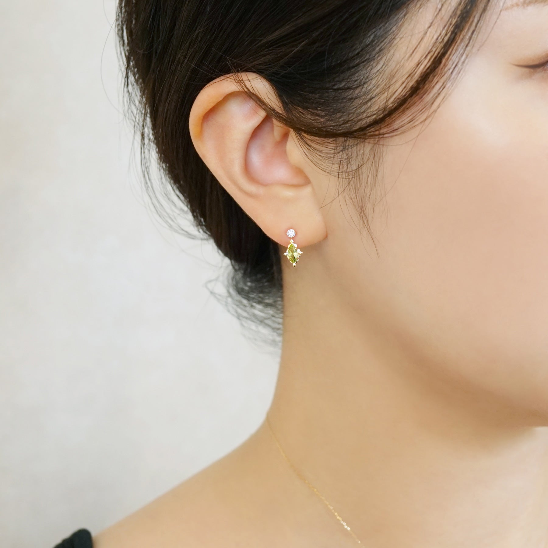 18K/10K Peridot and Moissanite Earrings [Nebula] (Yellow Gold) - Model Image