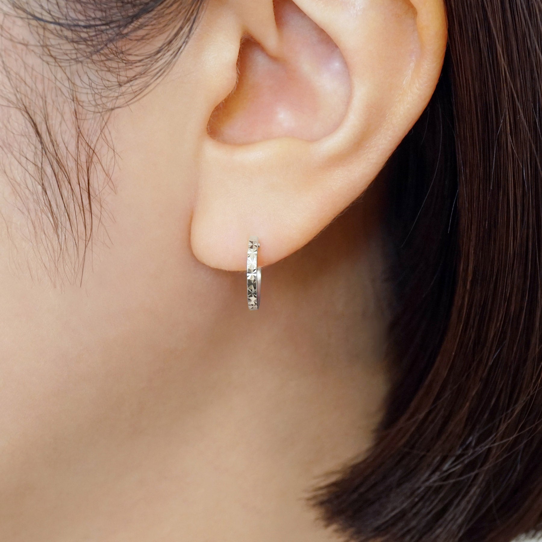 14K/10K Flower Cut Slender Hoop Earrings (White Gold) - Model Image