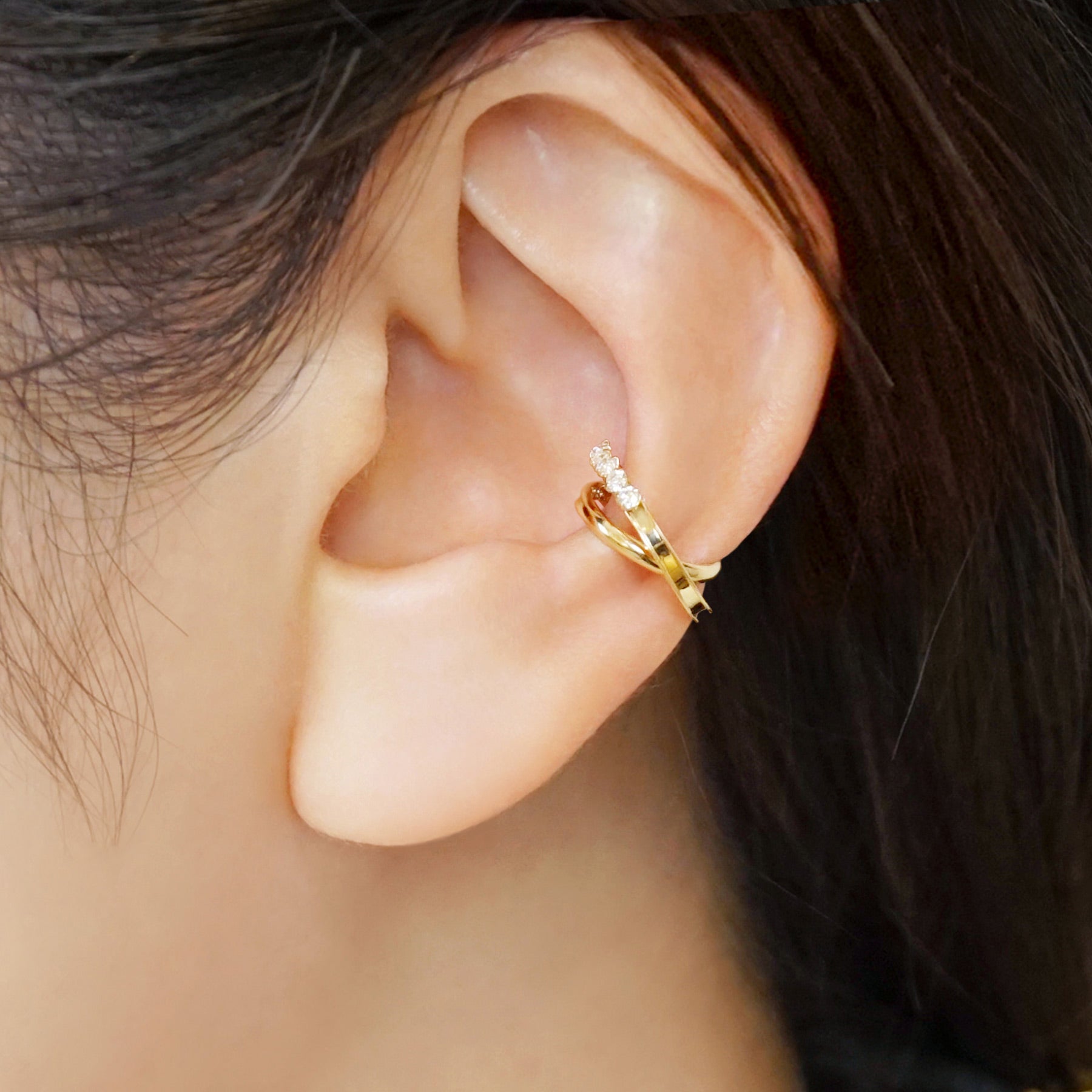 10K Crossed Line Ear Cuff (Yellow Gold) - Model Image
