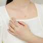 10K Freshwater Pearl Infinity Necklace (Rose Gold) - Model Image