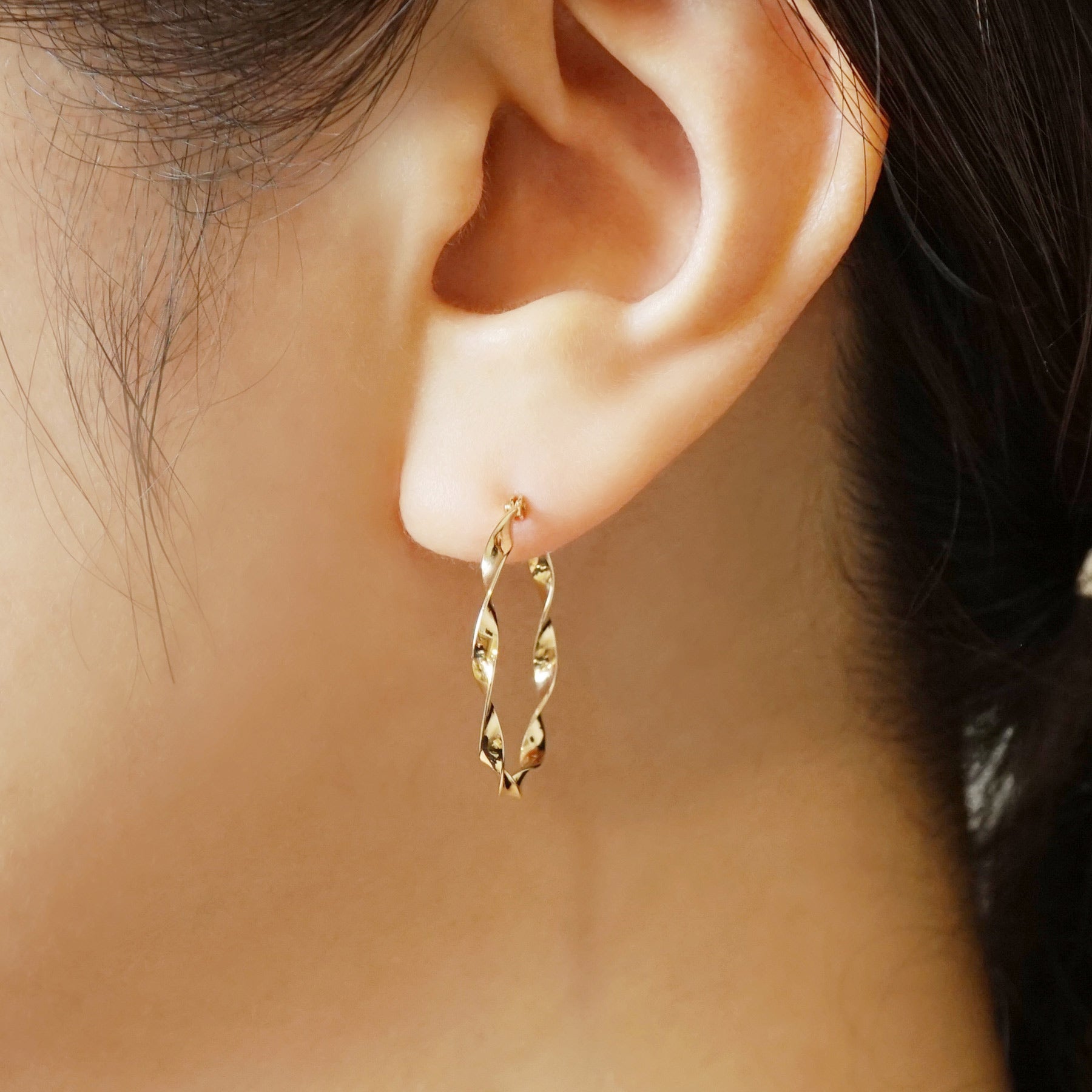 18K/10K Twisted Ribbon Hoop Earrings (Yellow Gold) - Model Image