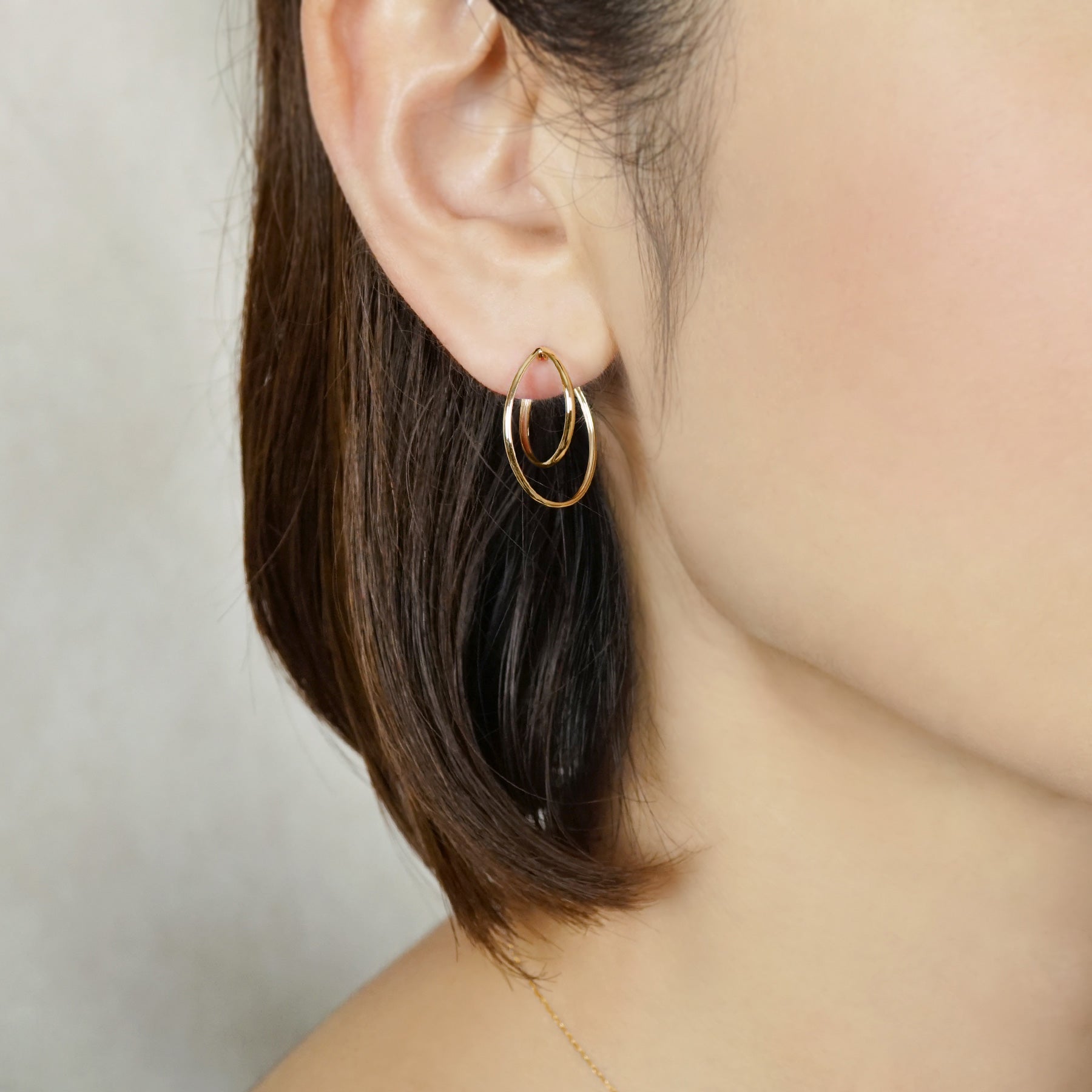 18K/10K Thin Line Double Hoop Earrings (Yellow Gold) - Model Image