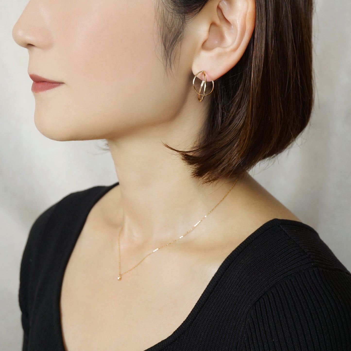 18K/10K Thin Line Double Hoop Earrings (Yellow Gold) - Model Image