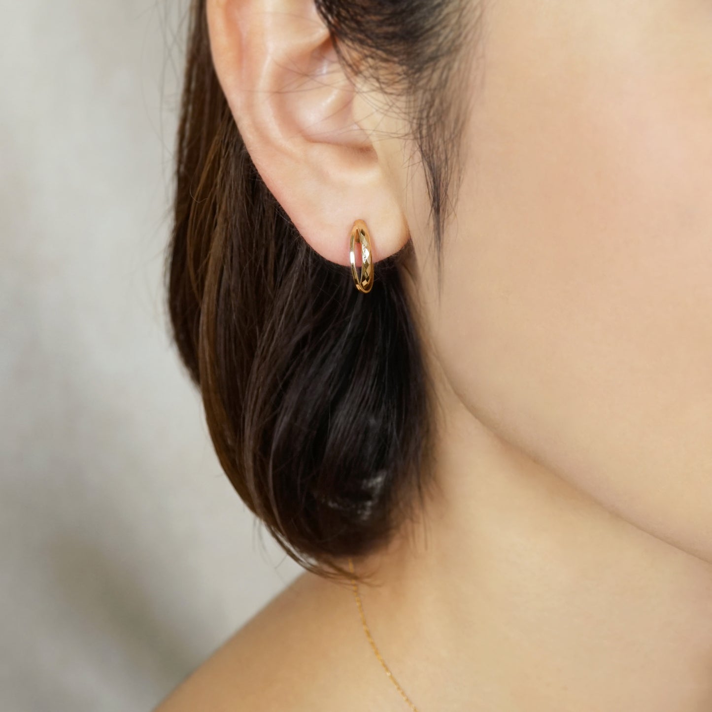 10K Mixed Cut Double Clip-On Hoop Earrings (Yellow Gold) - Model Image