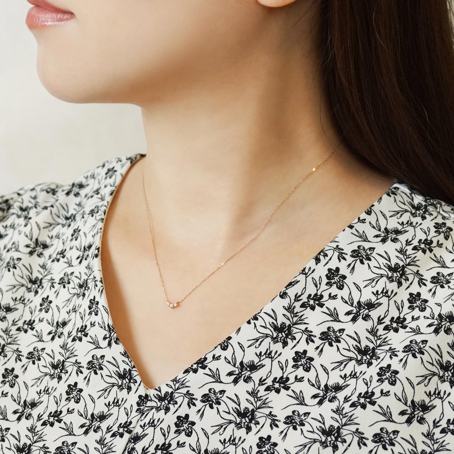 10K Trilogy Diamond Necklace (Rose Gold / Yellow Gold) - Model Image