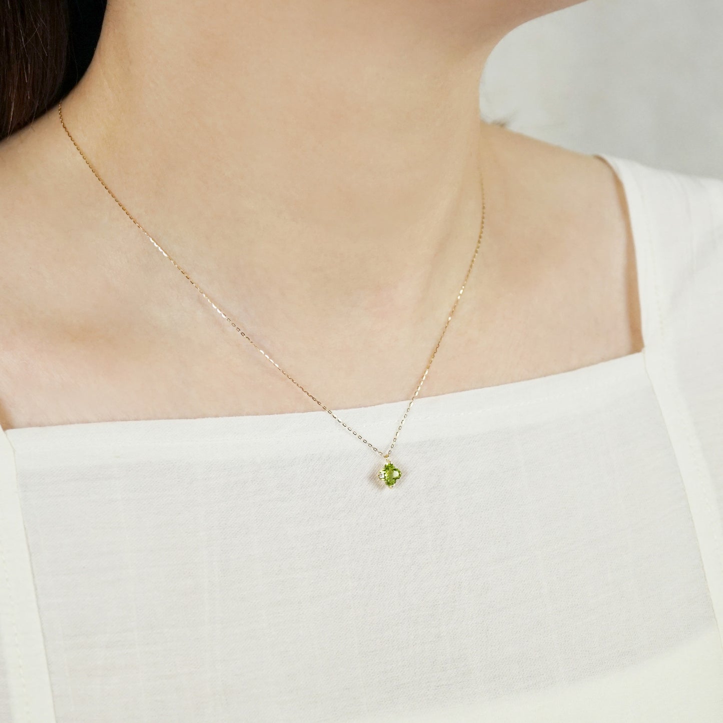 10K Peridot Lily Necklace (Yellow Gold) - Model Image