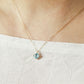 10K Blue Topaz Lily Necklace (Yellow Gold) - Model Image