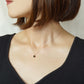 10K Onyx Lily Cut Necklace (Yellow Gold) - Model Image