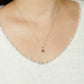 10K Moissanite Pink Tourmaline Necklace [Birth of a Star] (Yellow Gold) - Model Image