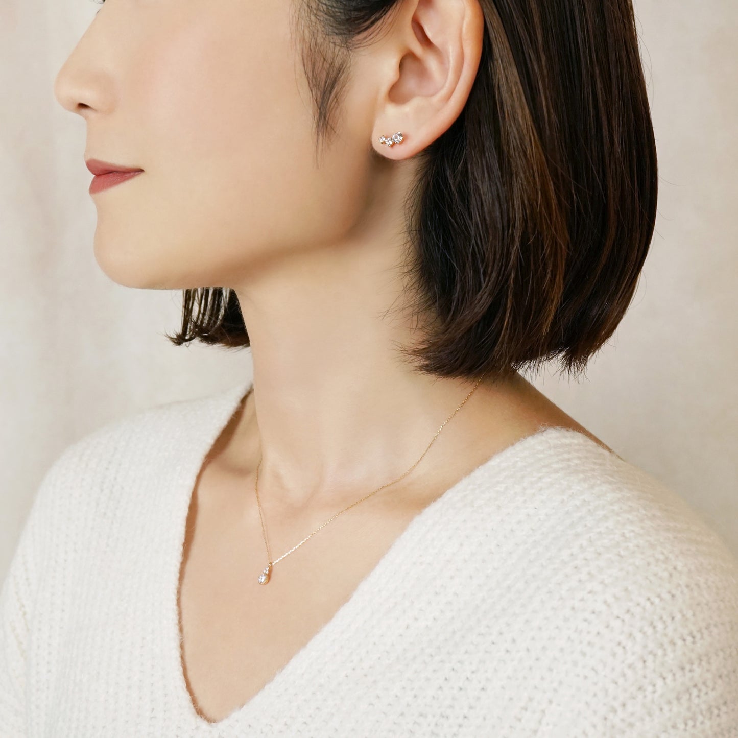 10K Cubic Zirconia Gradation Meteor Earrings (Yellow Gold) - Model Image