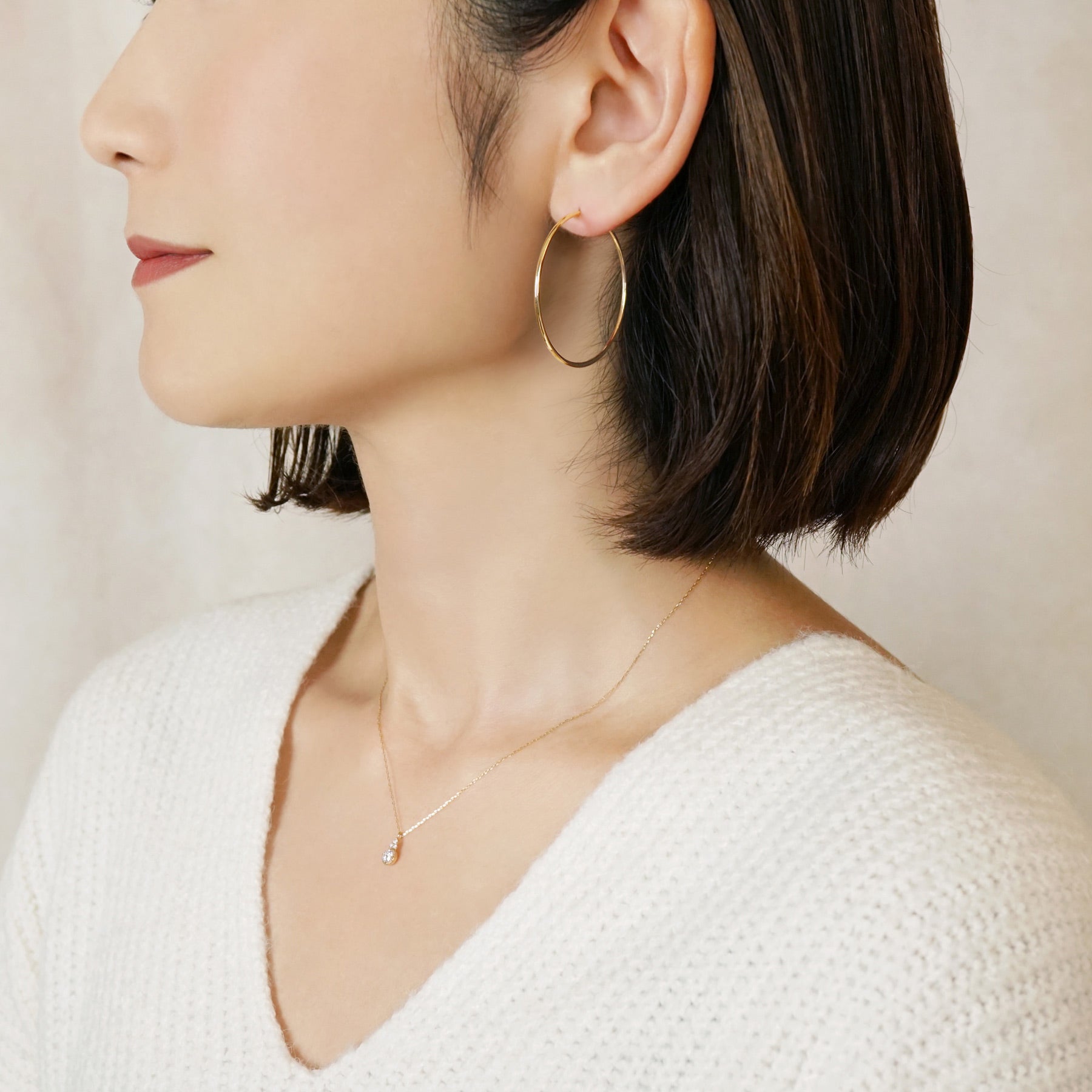 10K Seamless Pipe Hoop Earrings [40mm] (Yellow Gold) - Model Image