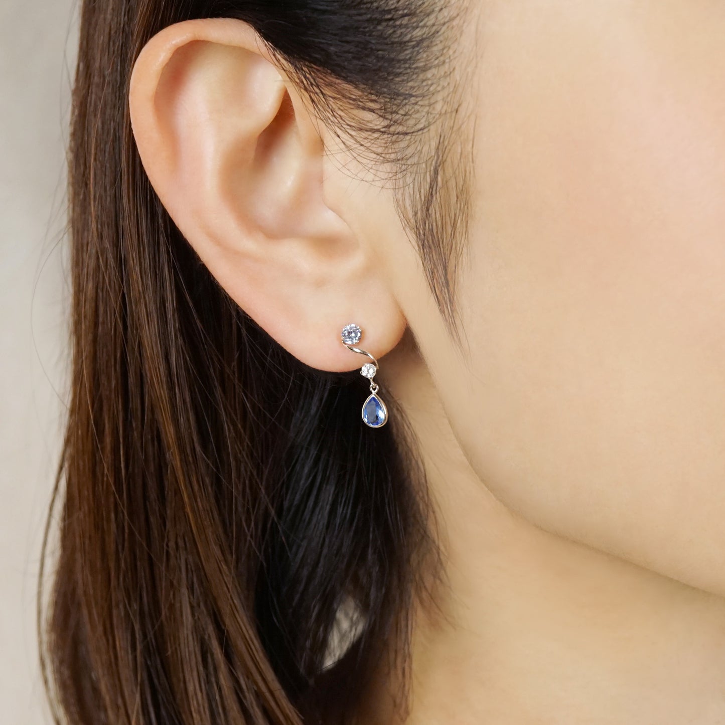 10K Blue Twisted Swinging Earrings (White Gold) - Model Image