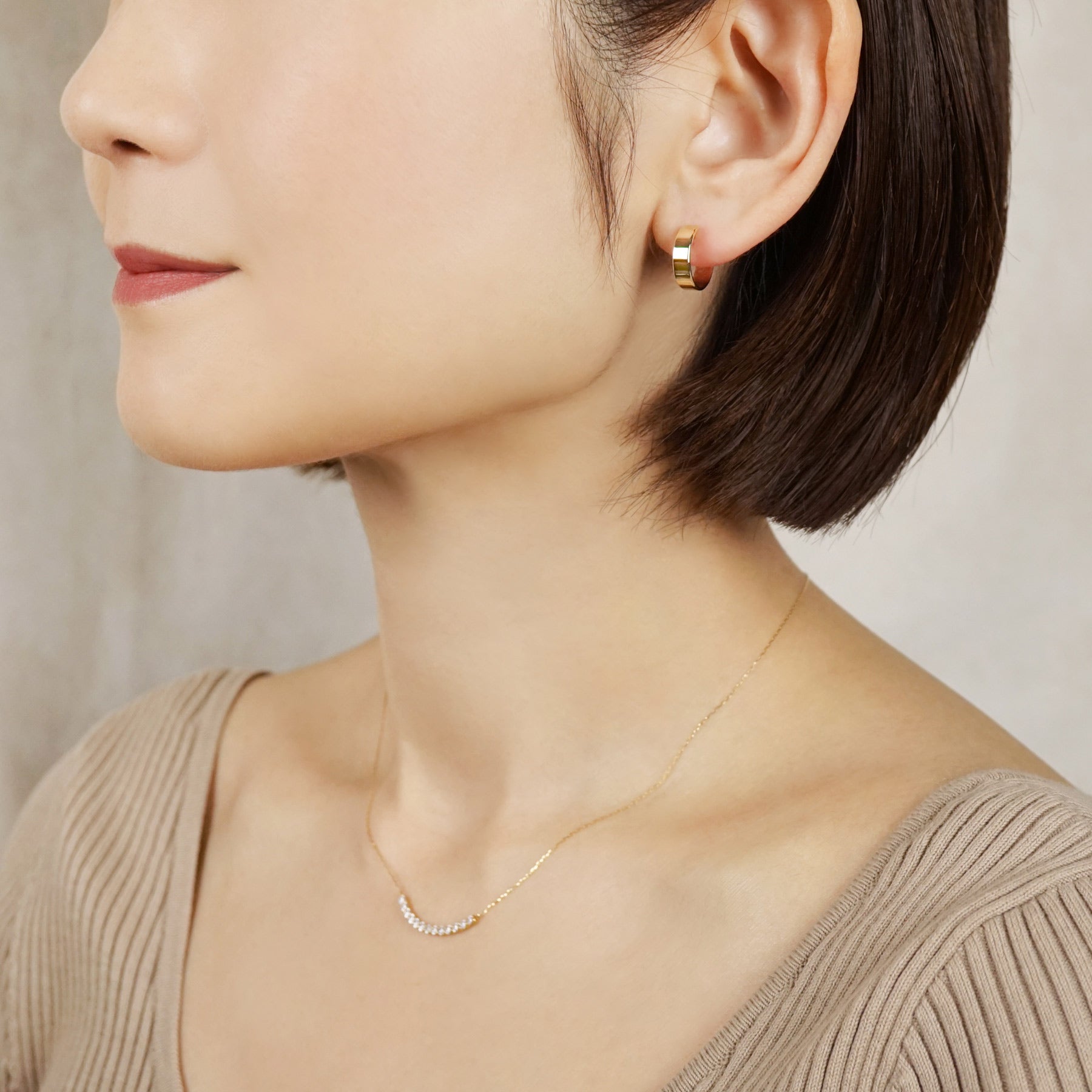 10K Basic Wide Hoop Earrings (Yellow Gold) - Model Image