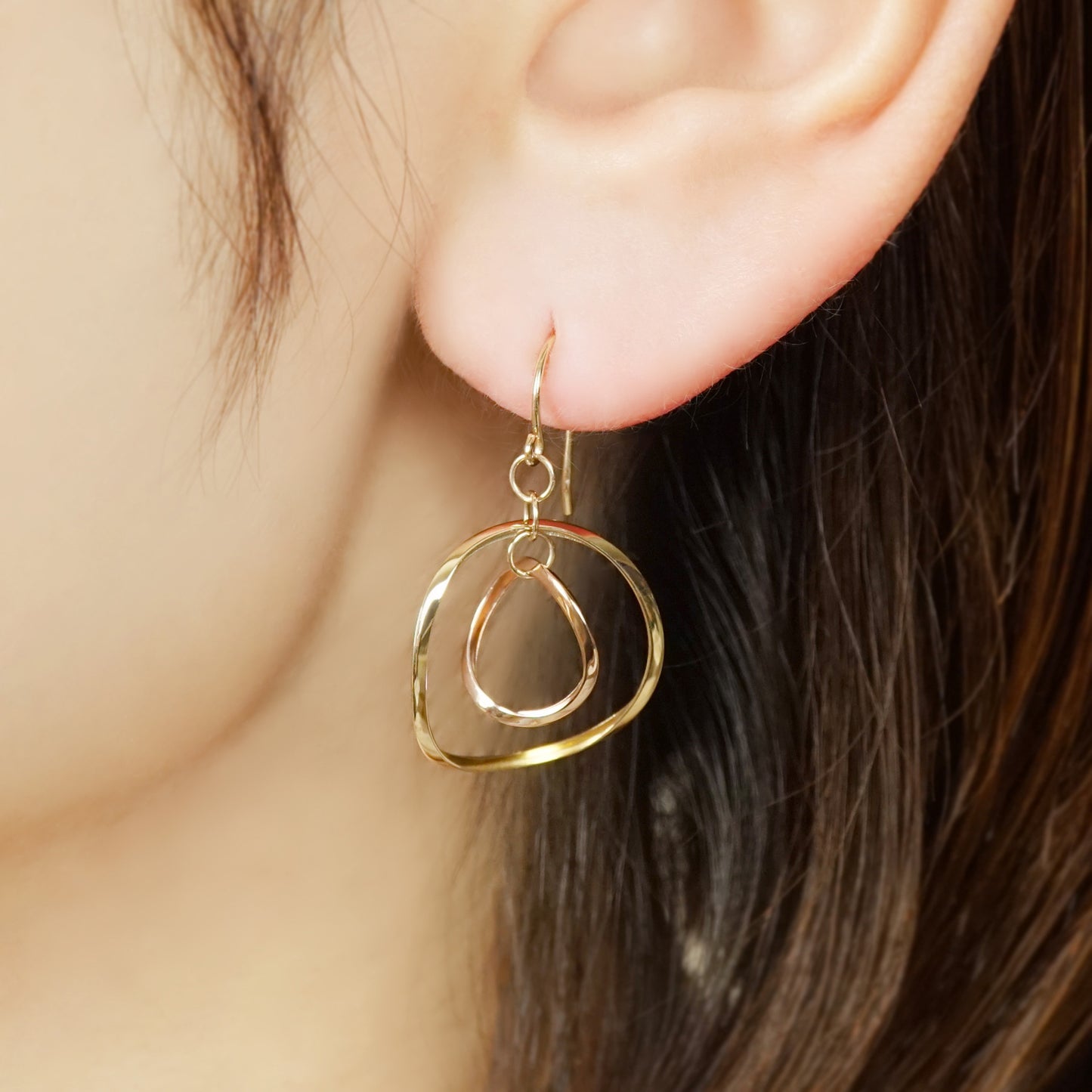 10K Twin Circle Swinging Earrings (Yellow Gold / Rose Gold) - Model Image