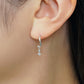 10K Ice Blue Diamond Twisted Earrings (White Gold) - Model Image