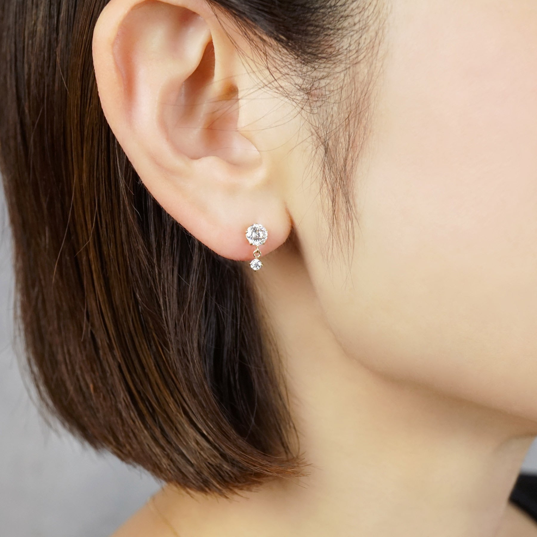 18K/10K Shooting Star Cut Moissanite Earrings (Yellow Gold) - Model Image