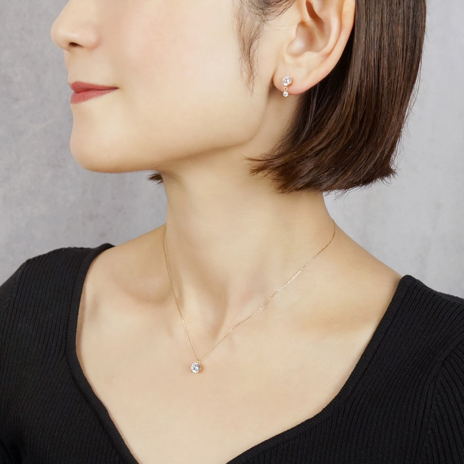 18K/10K Shooting Star Cut Moissanite Earrings (Yellow Gold) - Model Image