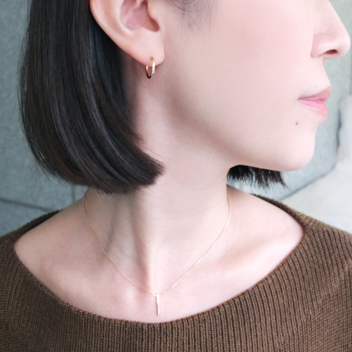 18K Pipe Hoop Earrings (Yellow Gold) - Model Image