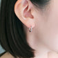 Platinum Pipe Hoop Earrings - Model Image