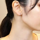 Platinum Pipe Hoop Earrings - Model Image