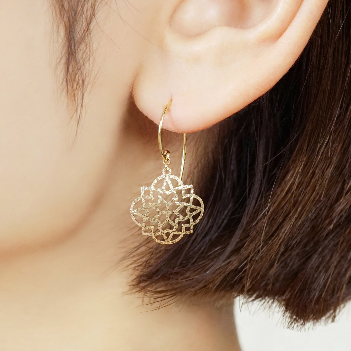 10K Openwork Flower Earrings (Yellow Gold) - Model Image
