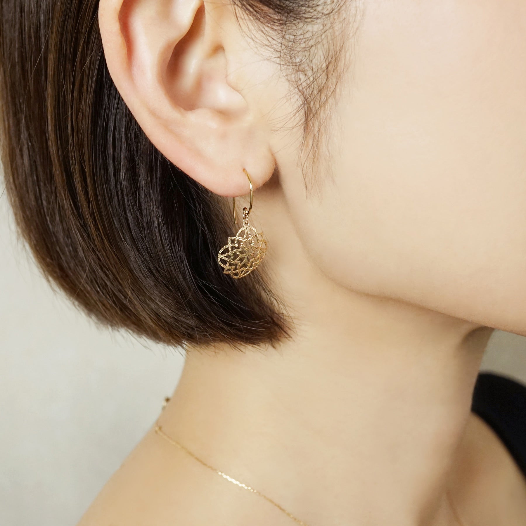 10K Openwork Flower Earrings (Yellow Gold) - Model Image