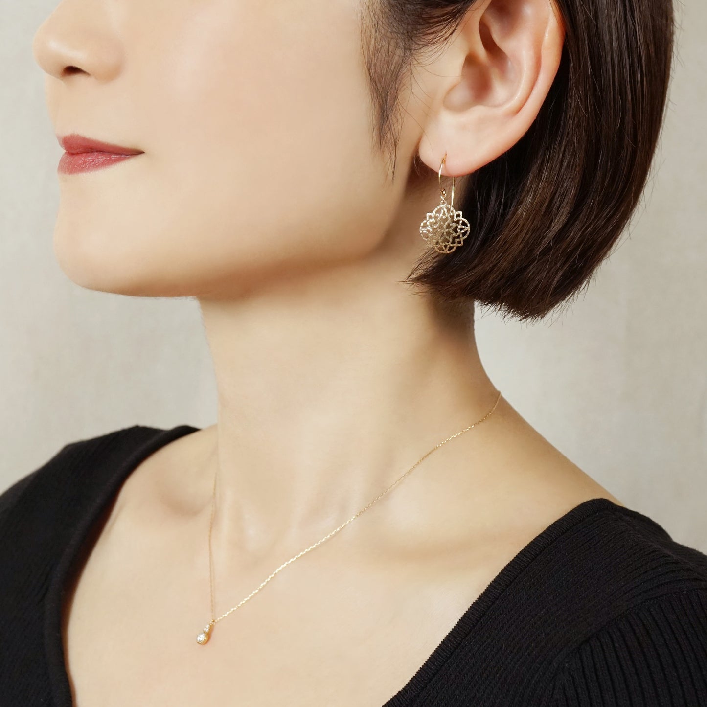 10K Openwork Flower Earrings (Yellow Gold) - Model Image
