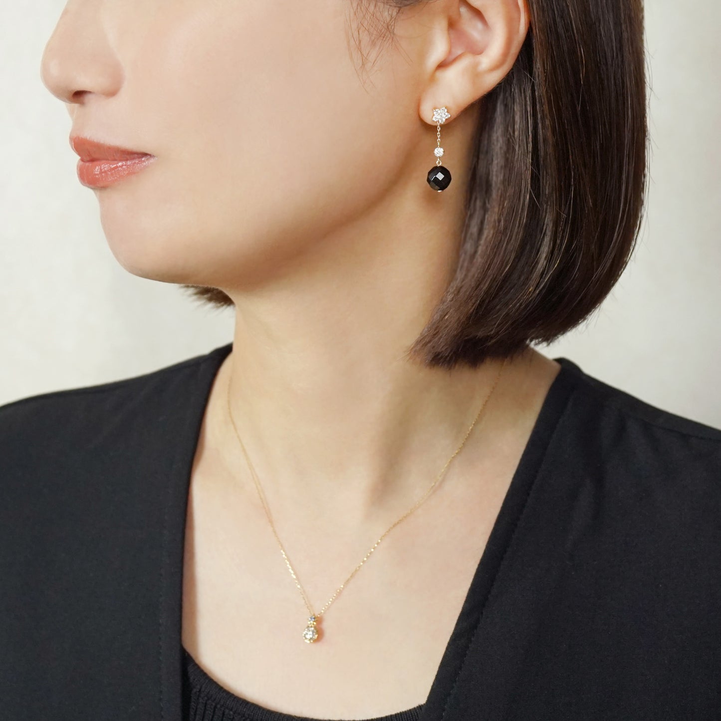 10K Subaru Moissanite Earring Charms (Yellow Gold) - Model Image