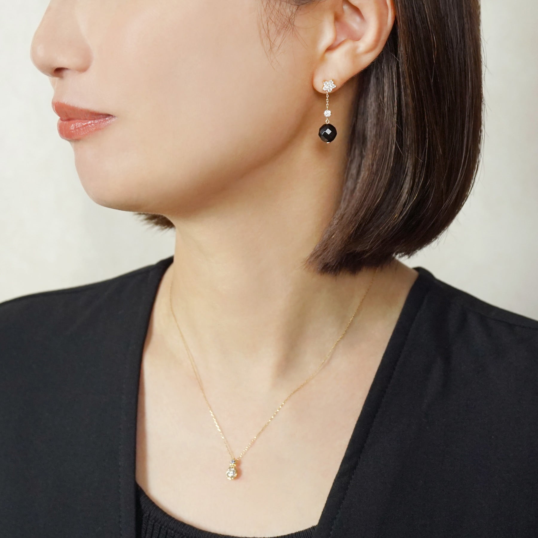10K Subaru Moissanite Earring Charms (Yellow Gold) - Model Image