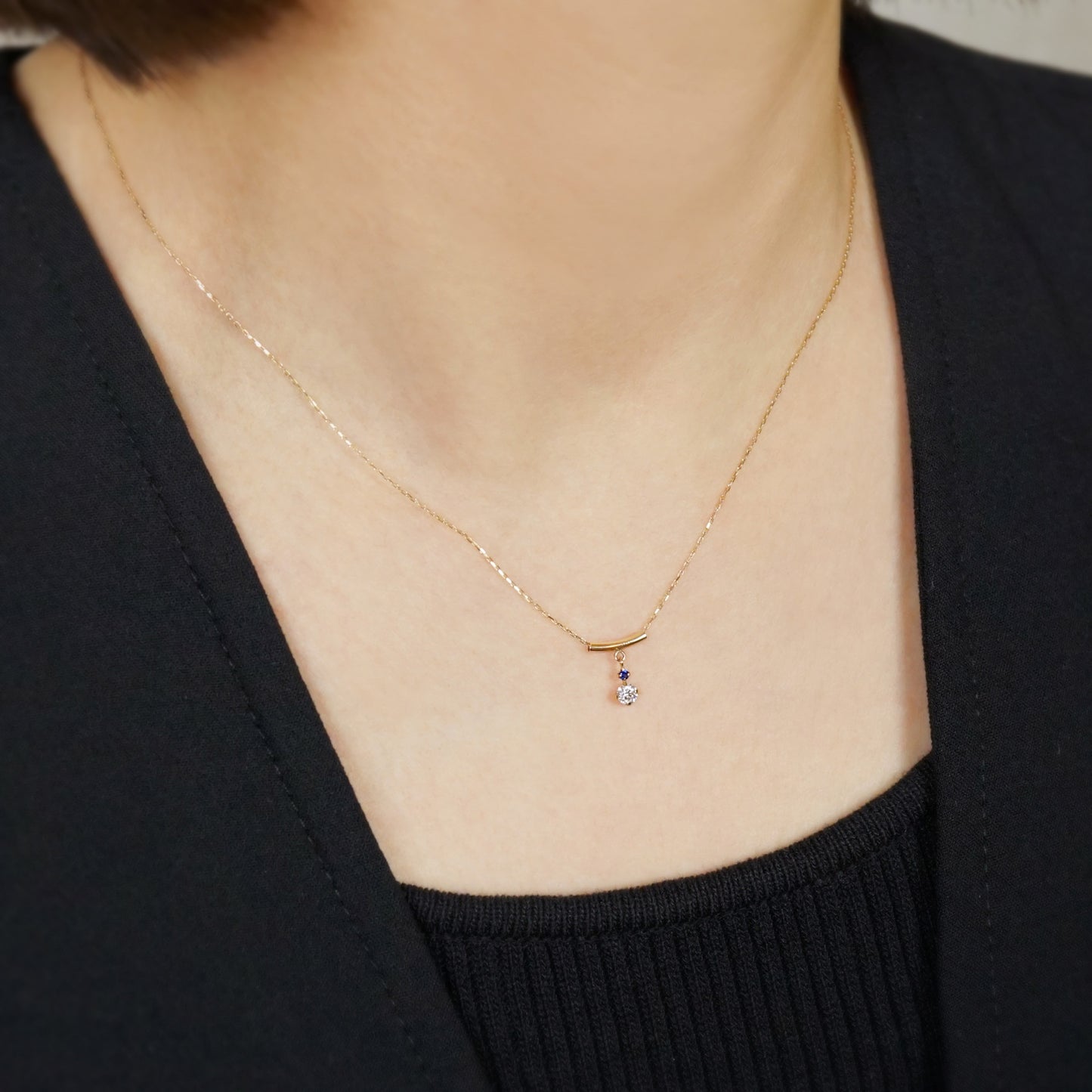10K Shooting Star Moissanite Necklace (Yellow Gold) - Model Image