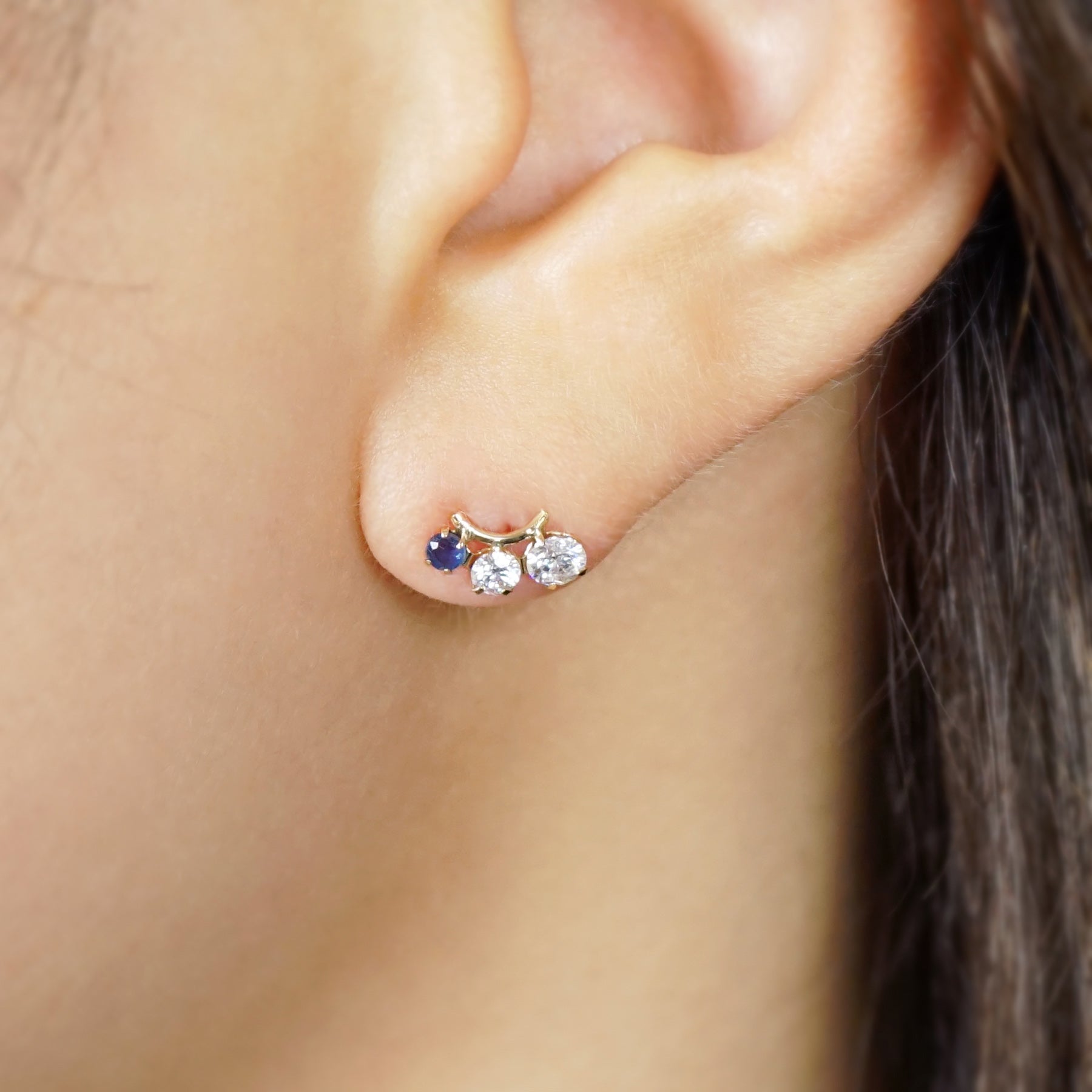 10K Shooting Star Moissanite Earrings (Yellow Gold) - Model Image