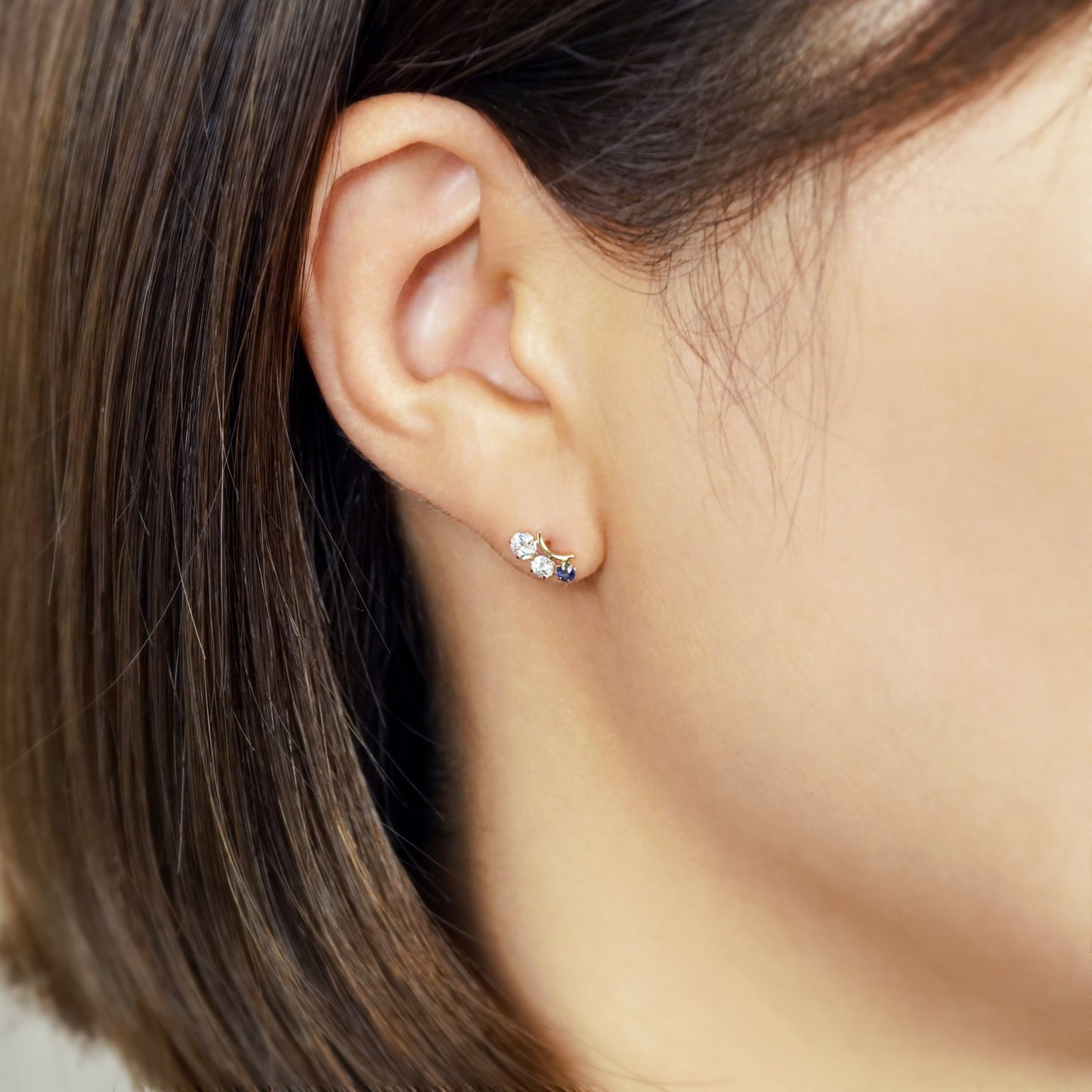 10K Shooting Star Moissanite Earrings (Yellow Gold) - Model Image
