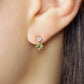 10K Comet Moissanite Earrings (Yellow Gold) - Model Image
