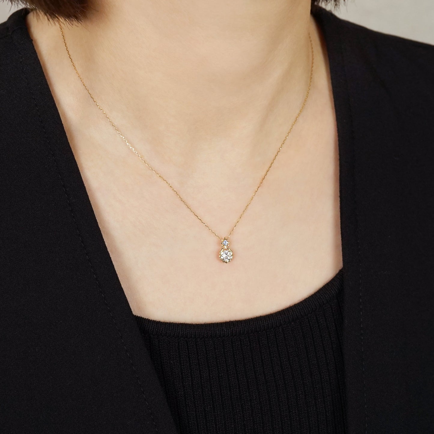 10K Sirius Moissanite Necklace (Yellow Gold) - Model Image