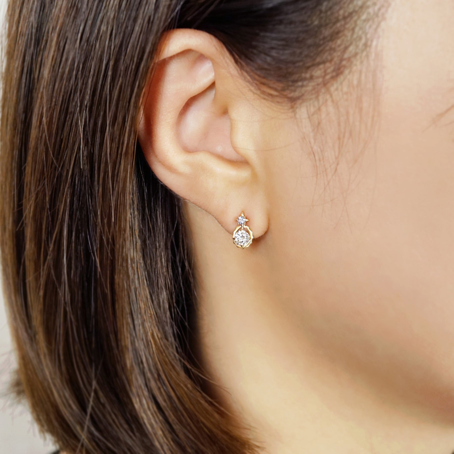 10K Sirius Moissanite Earrings (Yellow Gold) - Model Image