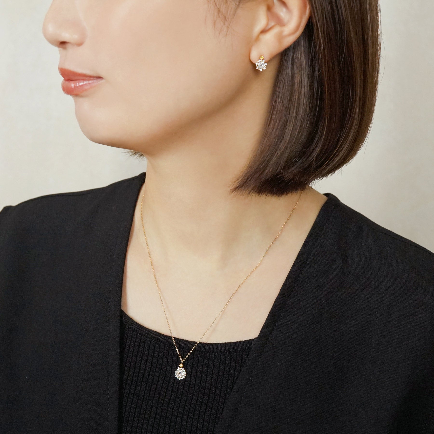 10K Sun Moissanite Necklace (Yellow Gold) - Model Image