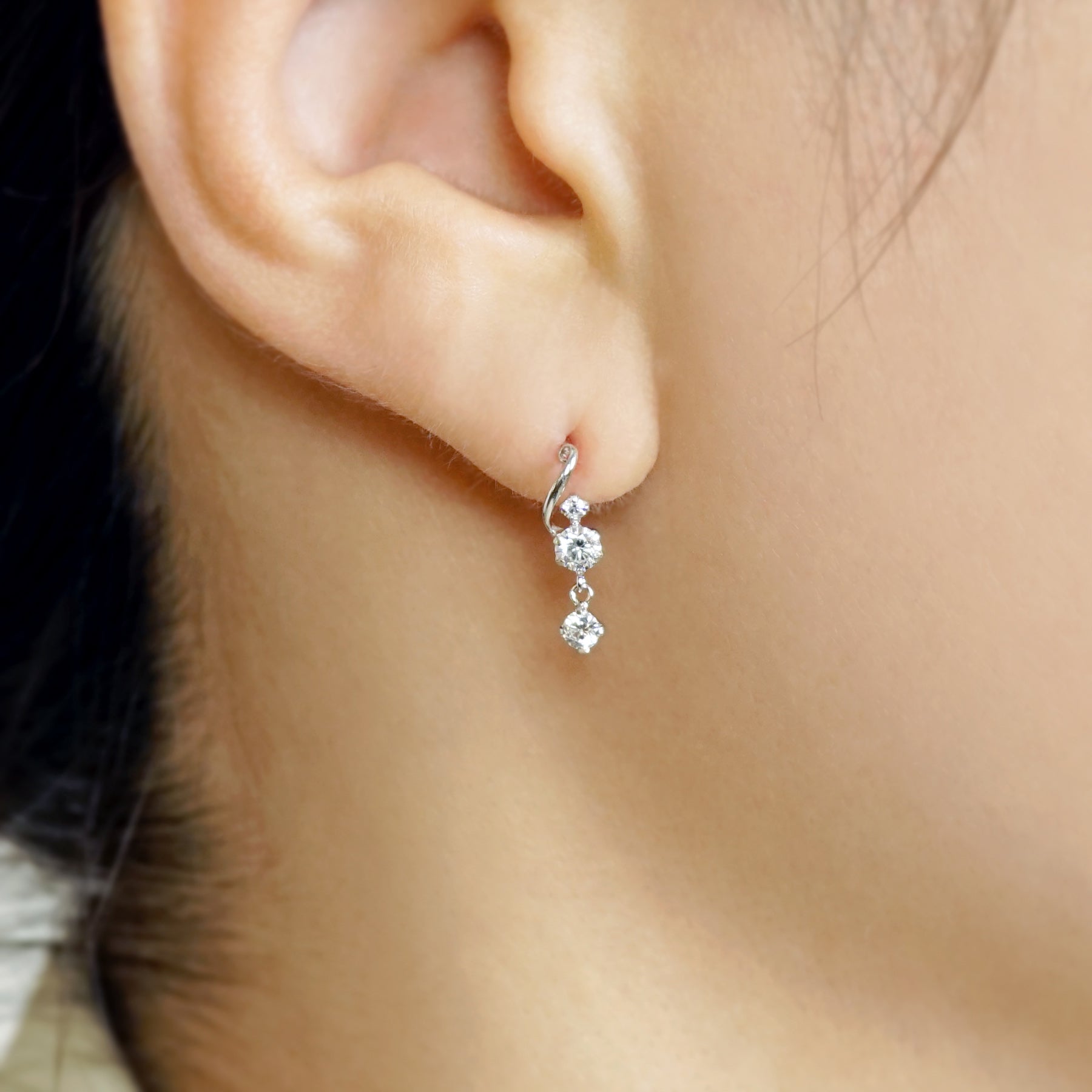 10K Twisted Line Swinging Earrings (White Gold) - Model Image