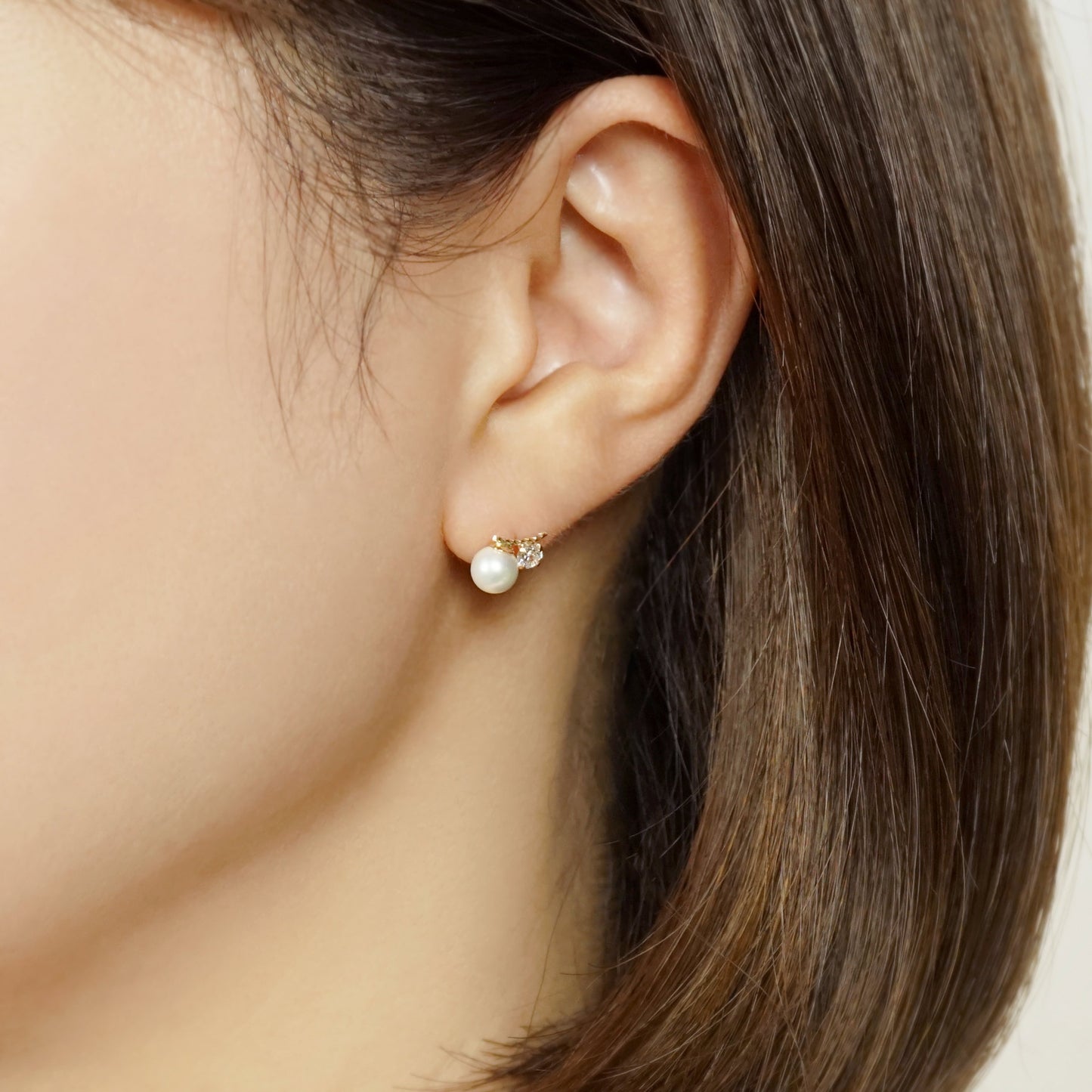 10K Shell Pearl Cubic Zirconia Meteor Earrings (Yellow Gold) - Model Image