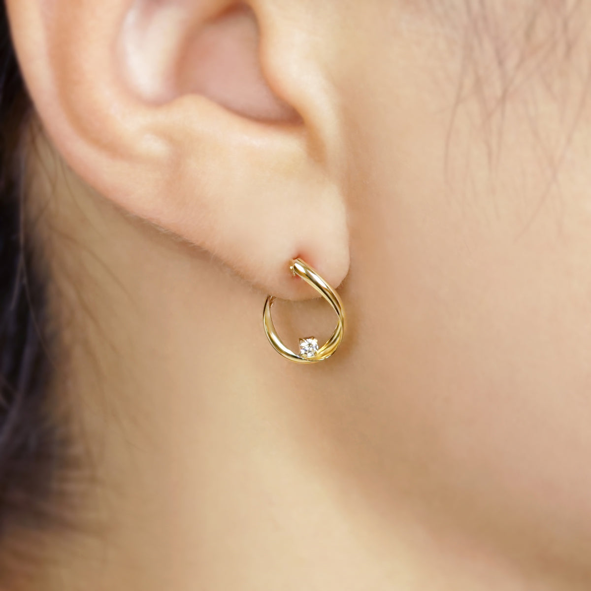 18K Diamond Twisted Hoop Earrings (Yellow Gold) - Model Image