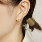 18K Diamond Twisted Hoop Earrings (Yellow Gold) - Model Image